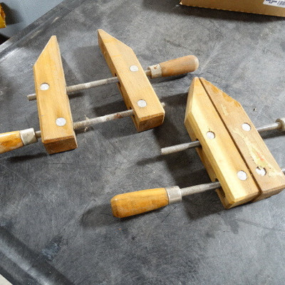 2 Wooden angle clamps.