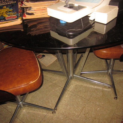 Retro Smoked Glass Table with Chrome Base and seating 