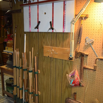 Hammer, Ax, Metal Ruler, and Mounted Lamp