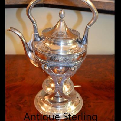 Antique sterling tilt tea pot