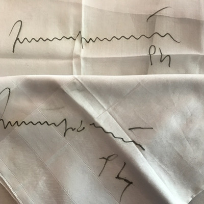 Luciano Pavarotti signed the handkerchief 
