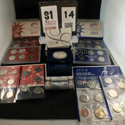 1) 2005 American Eagle One Ounce Silver Proof Coin in hard case inside blue velvet box

1) 2005 Silver Proof Set of 6 coins with in red...