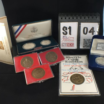 1) 1992 Proof Silver Dollar & Half Dollar set, The Columbus Quincentenary in velvet case.

1) 30th Anniversary Apollo 11 Coin, 1969-1999...
