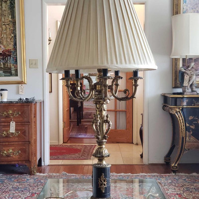 216: 	
	
This beautiful black and brass lamp is quite a conversation piece
This beautiful black and brass lamp is quite a conversation...