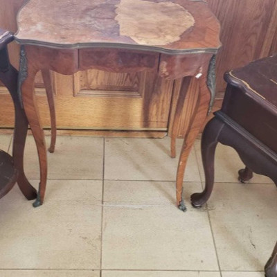 270: 	
	
3 Vintage Wooden End Tables
Ready to refinish in your favorite stain color! Lovely end tables with similar construction, carved...