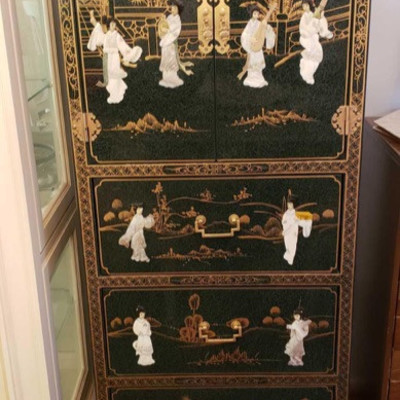 1500: 	
Asian cabinet with 7 compartments and mother of pearl accents
Measures approx. 16