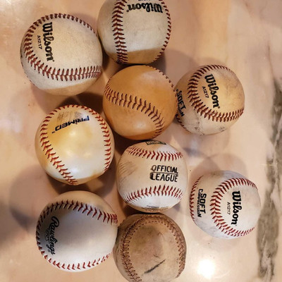 550: 	
9 Assorted Baseballs
9 Assorted Baseballs