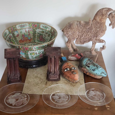 208: 	
Several collectors items shown here. Wooden Mask's, Book Ends, Glass Plates & More
Several collectors items shown here. Three...