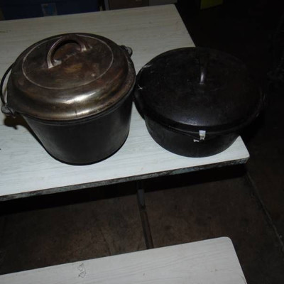 2 cast iron Dutch ovens