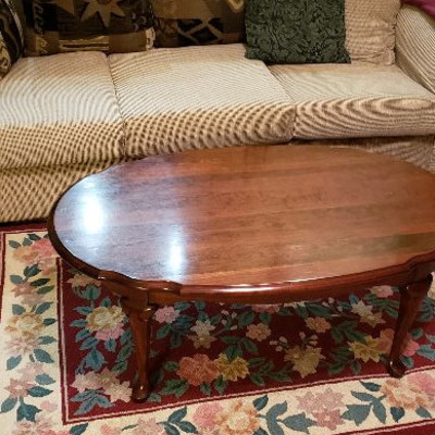 Couch & coffee table  Lots of nice area rugs like this one at sale.