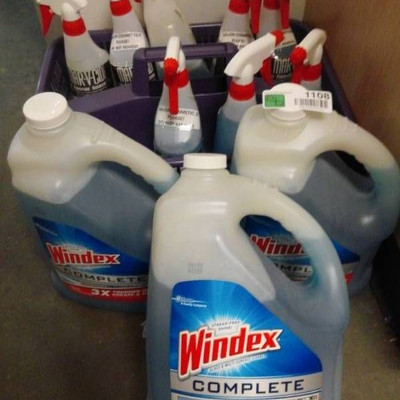Gallons and Spray Bottles of Windex Cleaner