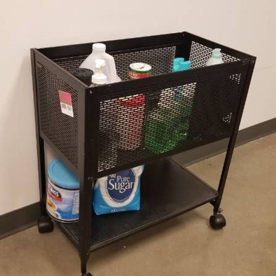 Cart with everything included mainly cleaning supp ...