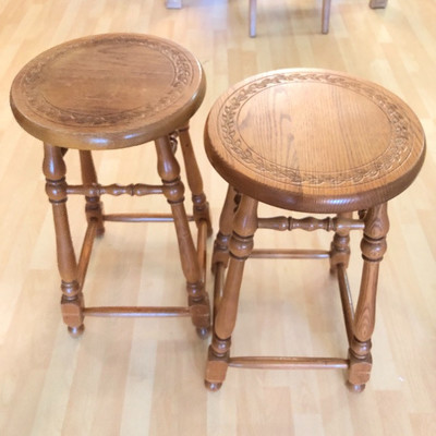 Pair carved wood low bar stools