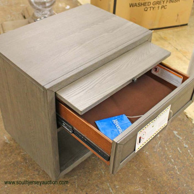  NEW One Drawer Grey Washed â€œStein World Furnitureâ€ Night Stand with Pull Out Tray and Media Plugs

Auction Estimate $50-$100 â€“...