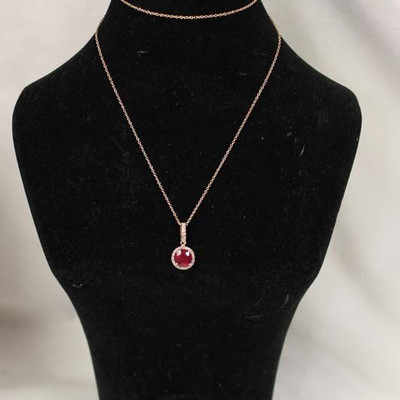  14 Karat Rose Gold 1 Â¼ Carat Ruby Pendant with 18â€ Rose Gold Necklace

Auction Estimate $1500-$2000 â€“ Located Inside 
