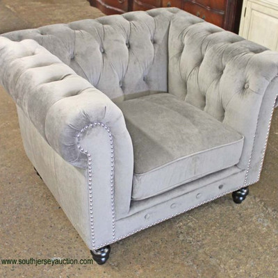  NEW Grey Upholstered Button Tufted Decorator Club Chair

Auction Estimate $200-$400 â€“ Located Inside 