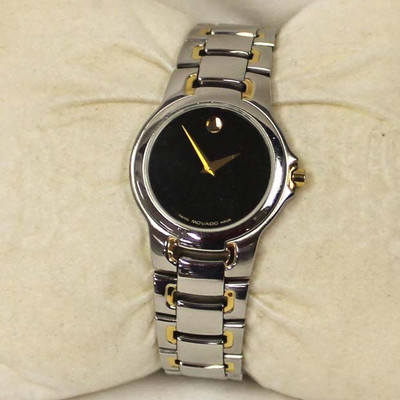  Yellow Gold and Stainless Steel LDS Black Face â€œMovadoâ€ Museum Watch

Auction Estimate $200-$400 â€“ Located Inside 
