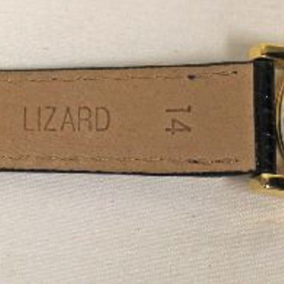  Yellow Gold Black Face Genuine Lizard Band â€œMovadoâ€ Museum Watch

Auction Estimate $100-$300 â€“ Located Inside 