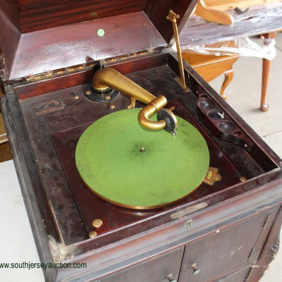  ANTIQUE Mahogany â€œVictorâ€ Victrola with Records

Auction Estimate $100-$300 â€“ Located Dock 