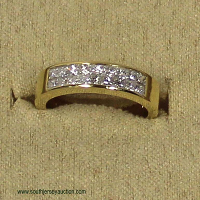  18 Karat Yellow Gold 1 CTW Princess Cut Diamond Band (H/I SI) Size 8

Auction Estimate $800-$1500 â€“ Located Inside 
