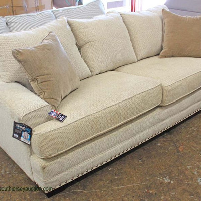  NEW Contemporary Tan â€œSimmonsâ€ Upholstered Beauty Rest Pocketed Coil Sofa with Decorative Pillows and Tags

Auction Estimate...