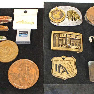  Tray Lots of Pen Knives, Lighter, Commemorative Coins, and Belt Buckles

Auction Estimate $20-$60 â€“ Located Inside 