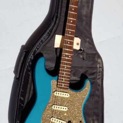 1861 	
Fender Guitar- Squier Strat
Fender Guitar- Squier Strat in Case