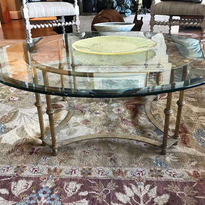 Vintage glass and metal coffee table $275
42 X 16