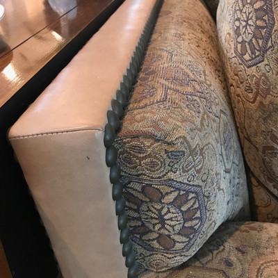 R. Jones custom made sofa with studded leather trim $2,200
94 X 34 X 40