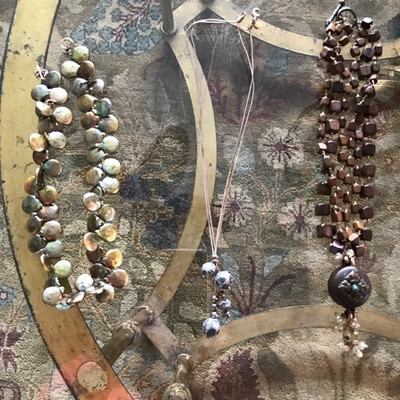 Necklace with pearl beads $125
Sterling necklace $110
Necklace with pendant $110