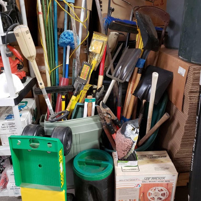 1210: 	
Gardening tools and equip.
Lot of gardening tools, scoot-n-do, hose reel, etc.