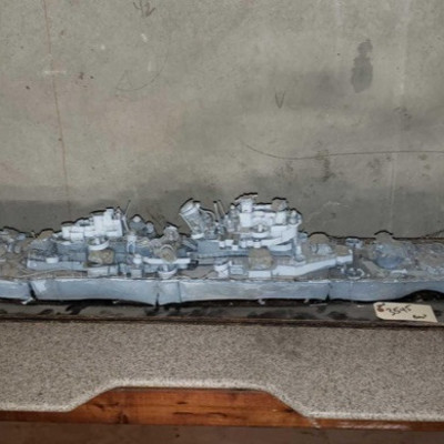 3545: 	
Model battleship
Model of a wreched battleship