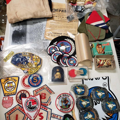 916: Patches, Belt Buckles, Flags, Hats, and More
Lots of cool things in this lot! Archery and bow hunters patches, belt buckles, Chinese...