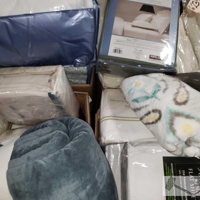 2341: 	
Four Boxes of Bagged Blankets
Blankets, plush throws, bed linen sets for queen and much more!!!