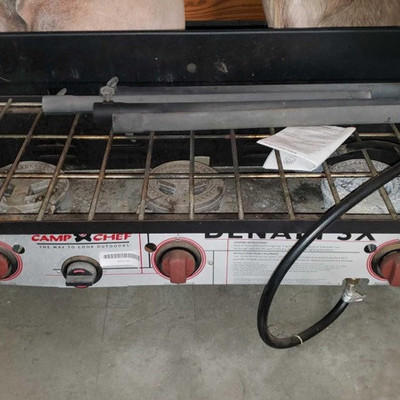 1001: 	
Camp Chef Denali Pro 3X stove
Camp Chef Denali Pro 3X camp stove has three 30,00 BTU burners, leg leveler, three sided wind...