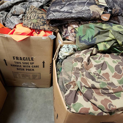 6006: 	
Three Boxes of Camo Clothing and Gear
Three boxes of some new camo clothing, matching hunting shirts and pants and some hunting...
