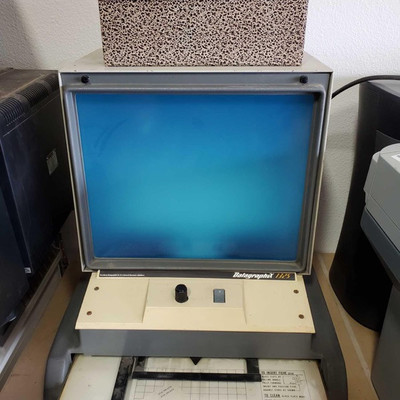 425: Datagraphic 1325 microfilm reader with storage box.
This is a Datagraphic 1325 microfilm/microfiche reader with storage box....