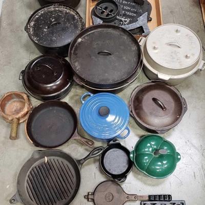 2337: Cast Iron Pots, Pans and Utensils, Cast Iron Barrel Stove Kit, Dutch Ovens, Copper Pan
Five cast iron pots with lids, two cast iron...
