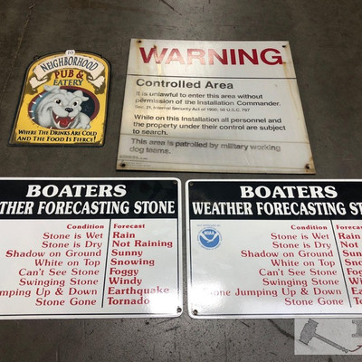 642: 	
Two Metal “Weather Forecasting Stone” Signs, Metal Warning Sign and Neighborhood Pub Sign
Largest measures approx 18” x 18