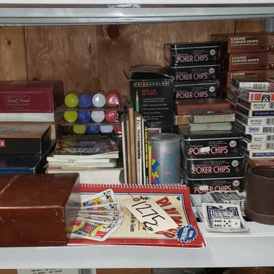 1275: 	
Casino Game Pieces, Casino Related Books, Boxed Games, Art Pencil Kit
Approx Thrity-Two boxes of cards, approx thirty sets of...