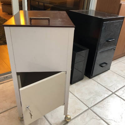 Metal file cabinets. One on casters.