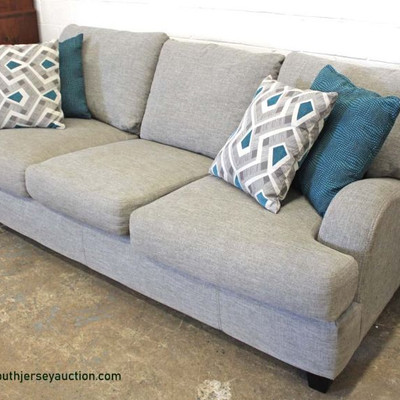 NEW Contemporary Grey Upholstered Decorator Sofa with Throw Pillows
Auction Estimate $200-$400 â€“ Located Inside
