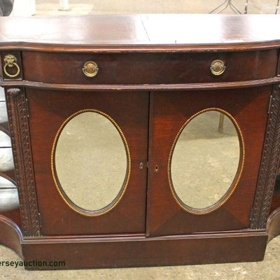 Mahogany Leather Top Oval Mirrored Door One Drawer 2 Door Credenza
Auction Estimate $100-$300 – Located Inside
