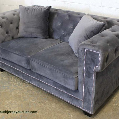 NEW Contemporary Grey Upholstered Button Tufted Decorator Sofa
Auction Estimate $200-$400 â€“ Located Inside
