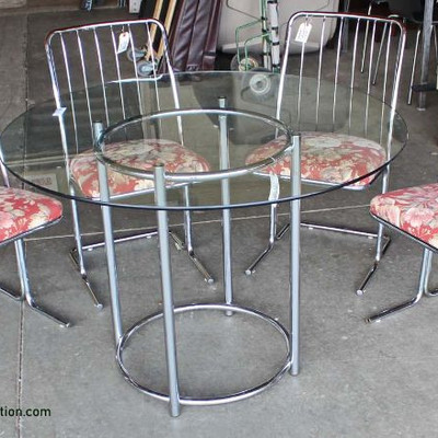 5 Piece Modern Style â€œDaystromâ€ Glass Top Chrome Base Table and 4 Chairs
Auction Estimate $200-$400 â€“ Located Inside
