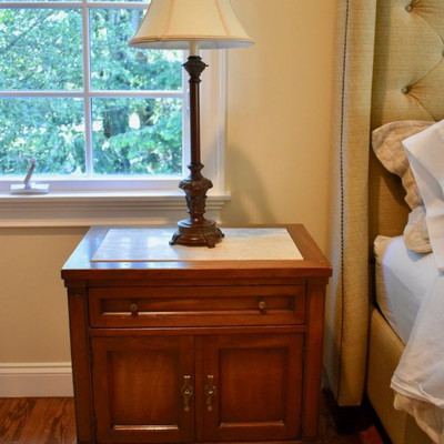 One of a pair of White Furniture travertine top nightstands