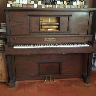 Waters-Autola Upright Player Piano with Music Rolls. Restoration needed. Restored value approx  $.22,000. See antique piano shop.com