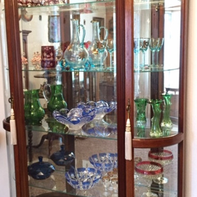 Display cabinet with cut crystal and collectible glass