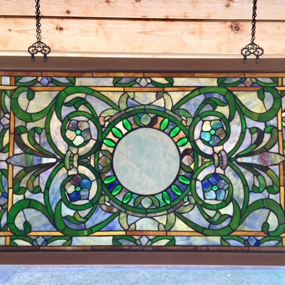 Framed stained glass panel