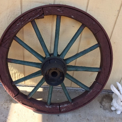 One of three antique wagon wheels